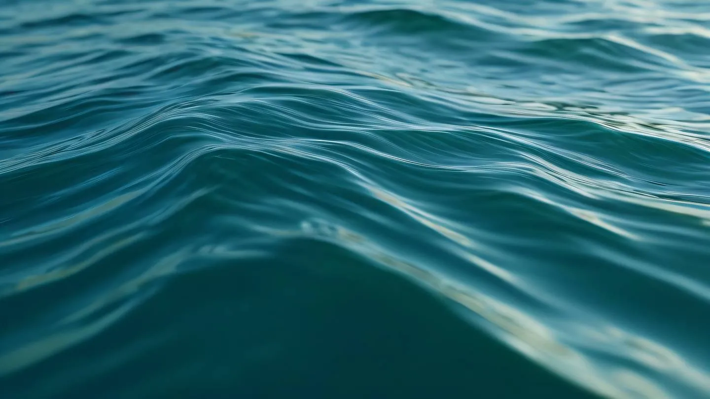 Abstract flowing water elements with crisp teal sage green and deep ocean blue colors rippling and interweaving captured from side angle with macro lens high-quality ultra-realistic cinematic 8K UHD high resolution sharp and detail