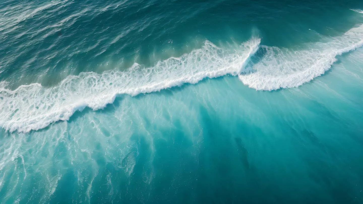 Ocean waves forming geometric patterns viewed from above with bright turquoise and white colors creating a natural abstract pattern captured from a bird's eye view high-quality ultra-realistic cinematic 8K UHD high resolution sharp and detail