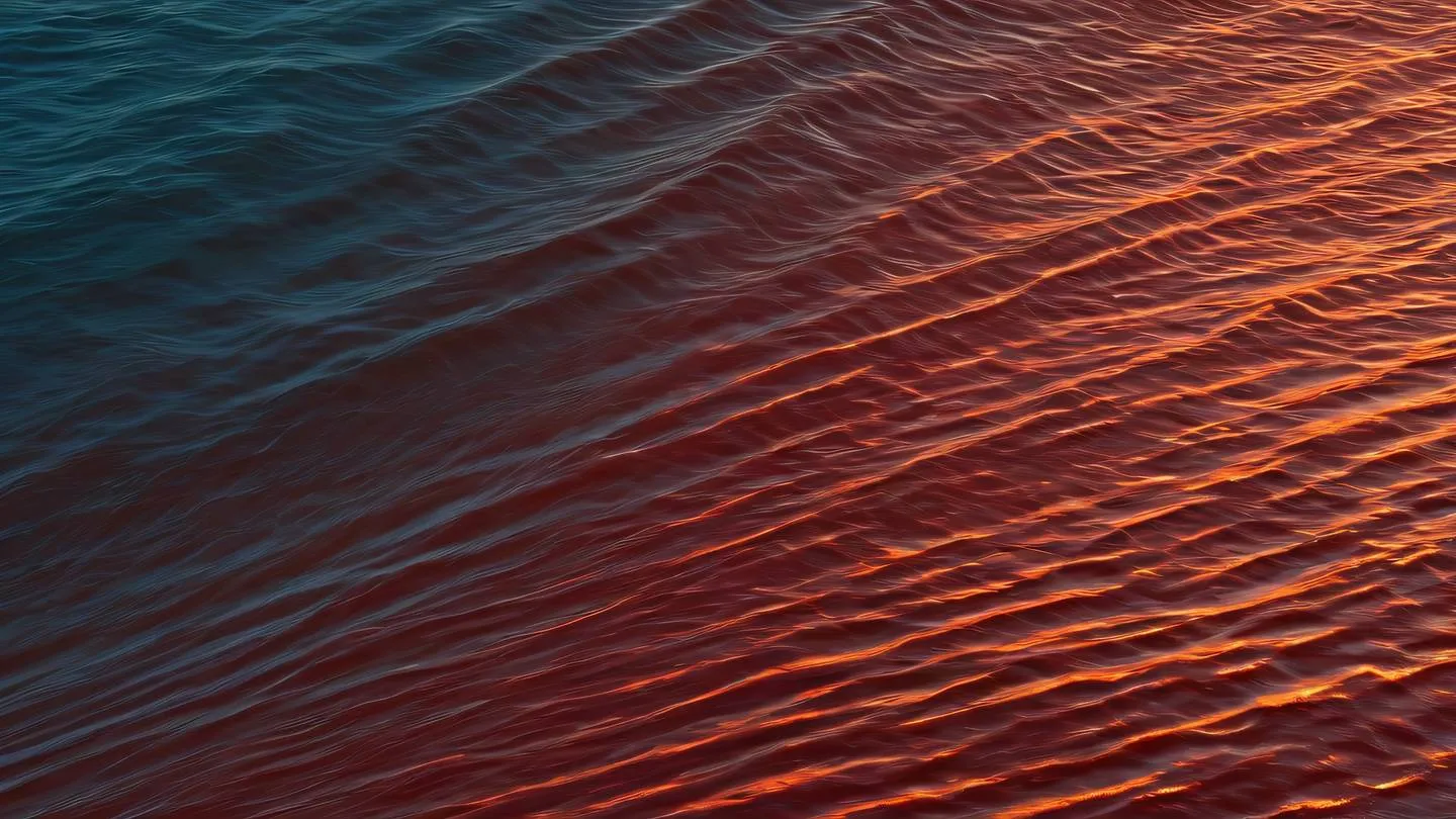 Geometric sea waves in bold orange and blood red colors creating a pattern of parallel lines and movement photographed from an aerial perspective high-quality ultra-realistic cinematic 8K UHD high resolution sharp and detail