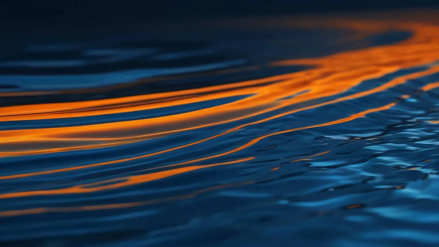 Elegant rippling water surface reflecting light minimalist composition with bright orange and deep blue colors shot from a 45-degree angle high-quality ultra-realistic cinematic 8K UHD high resolution sharp and detail