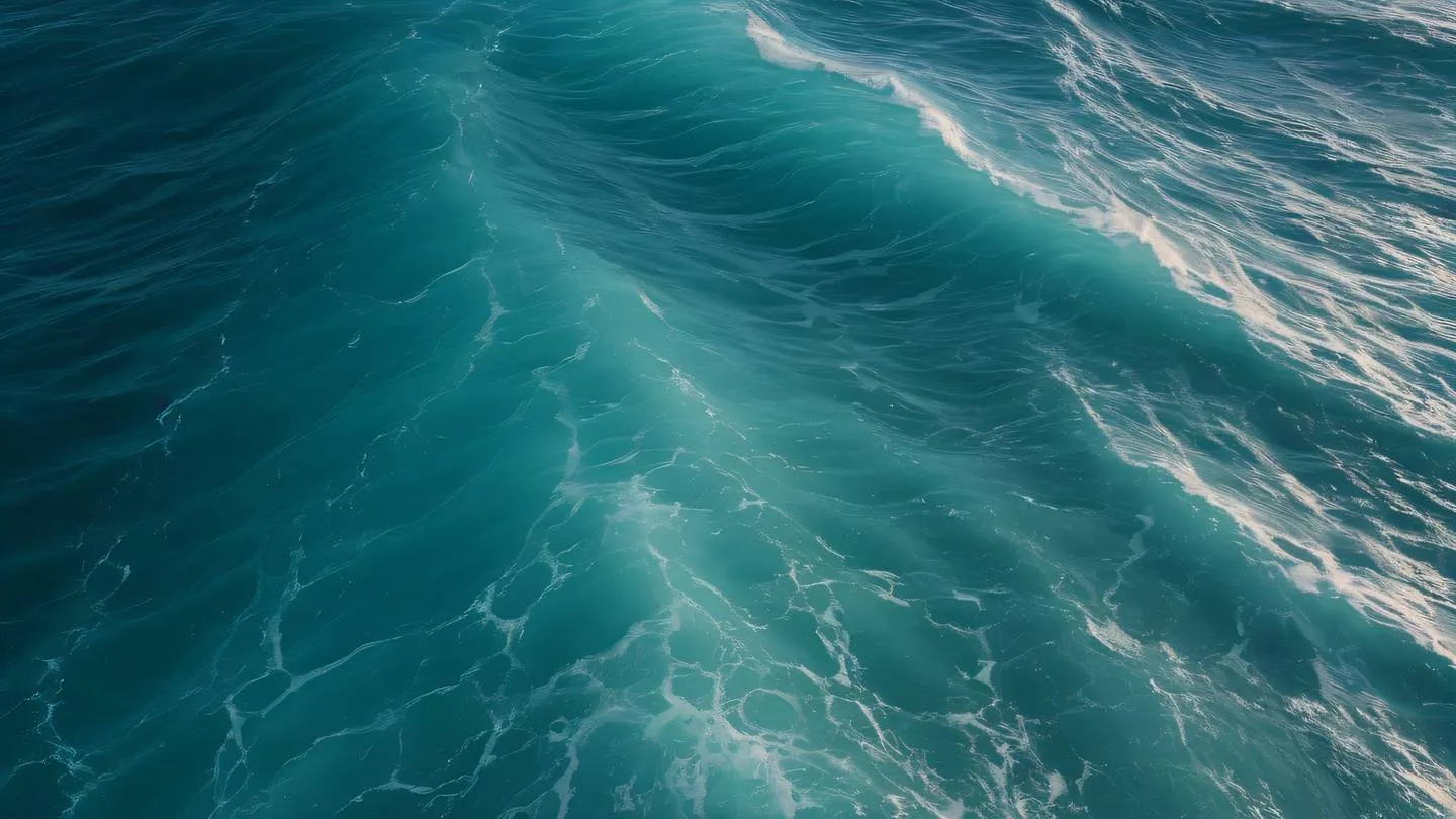 Ocean waves forming circular patterns with baby blue and salmon-orange colors merging in the water shot from a bird's eye view high-quality ultra-realistic cinematic 8K UHD high resolution sharp and detail