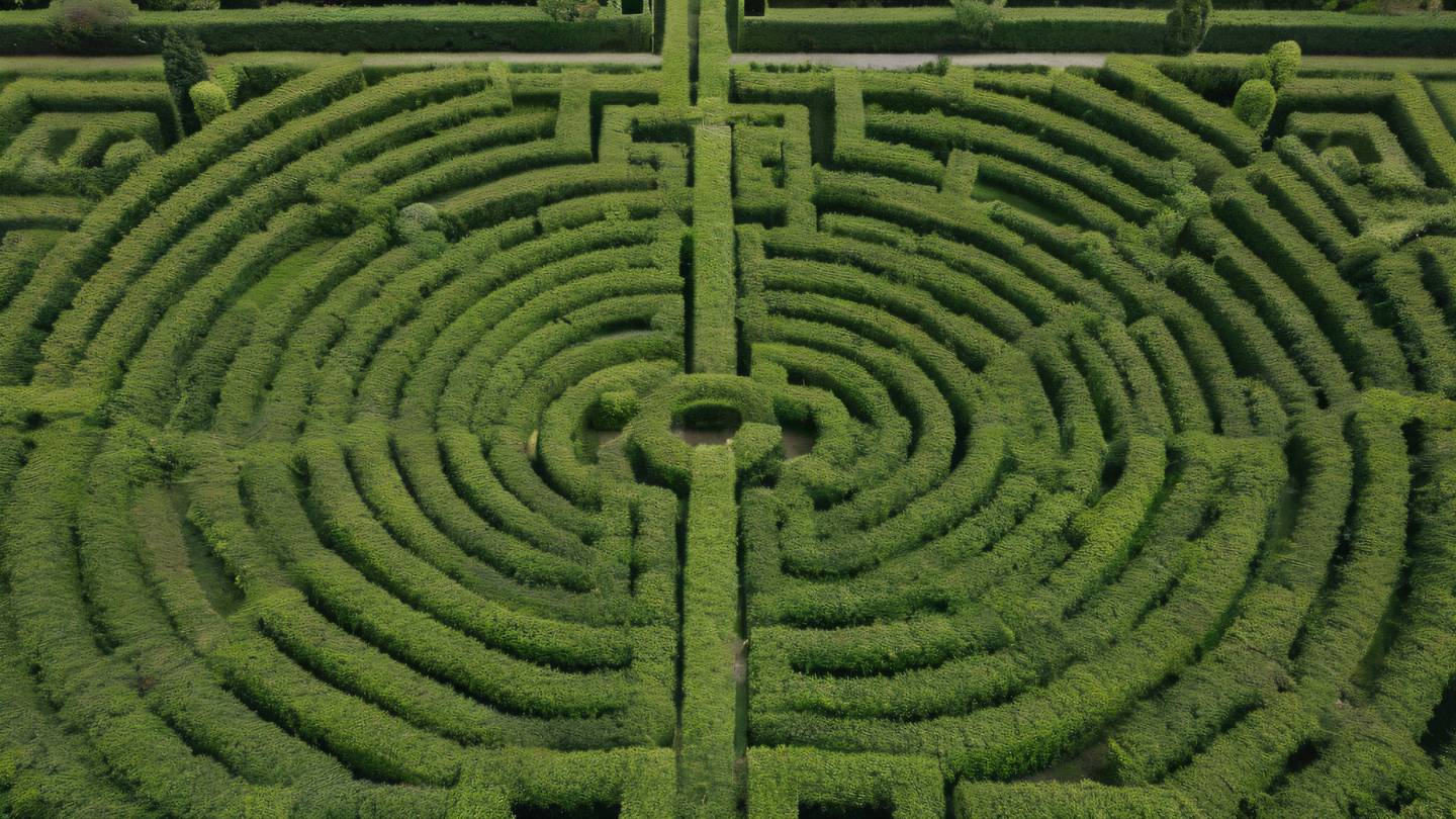 Overhead view of a pristine natural maze formed by hedges in bright neutral beige and olive green colors photographed from directly above with perfect symmetry high-quality ultra-realistic cinematic 8K UHD high resolution sharp and detail