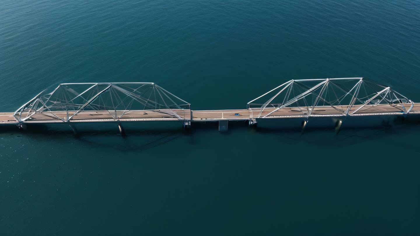 A series of interconnected geometric bridges spanning across a calm water body shot from a bird's eye view. Colors: Contemporary zinc metallic structures reflecting in crystal clear water with warm brown wooden walkways creating a harmonious blend. Style: high-quality ultra-realistic cinematic 8K UHD high resolution sharp and detail