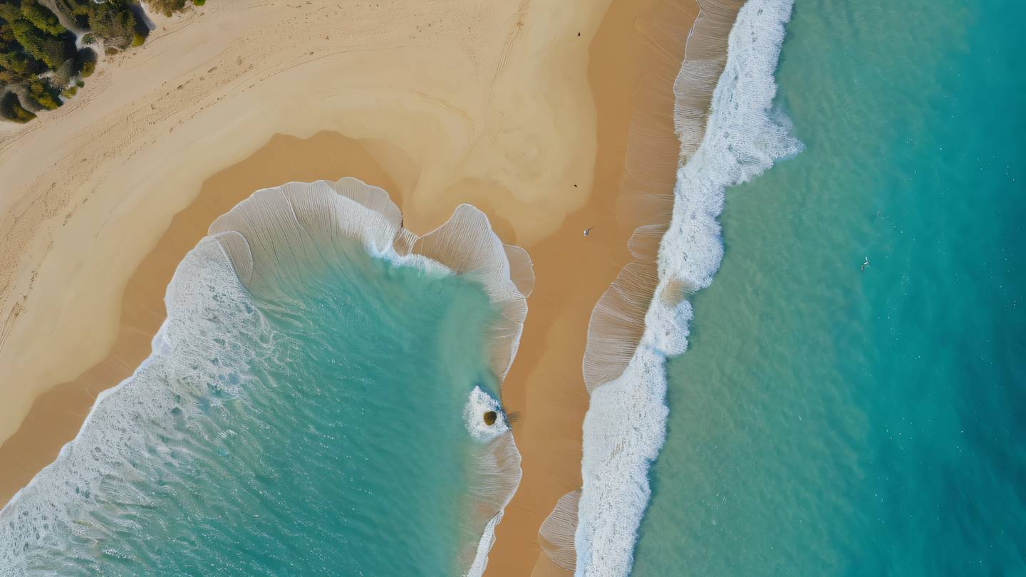 Aerial view of a pristine coastline where golden yellow sand meets turquoise ocean waters creating natural flowing patterns ultra-realistic cinematic 8K UHD high resolution sharp detail drone perspective 45 degrees